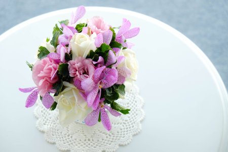 Floral on white deskの写真素材
