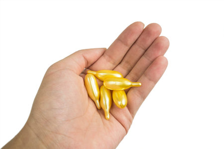Golden Pills in Hand