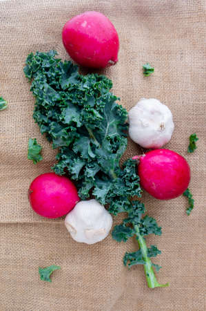 Fresh vegetables over linen clothの写真素材