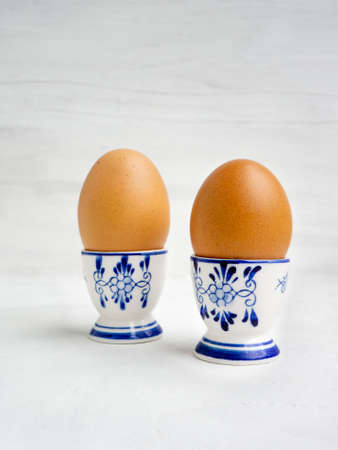 Boiled eggs on Dutch egg cupsの写真素材