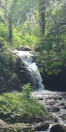 the waterfall is very beautiful with a very clear water flowの写真素材
