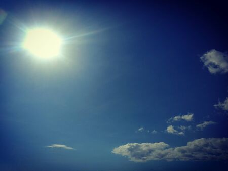 the view of the blue sky and sun in the morning is very beautifulの写真素材