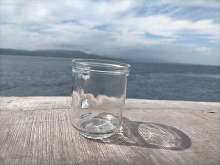 clear glass cups look beautiful with blue sky and white cloudsの写真素材