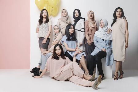 a group of women with a variety of model clothesのeditorial素材