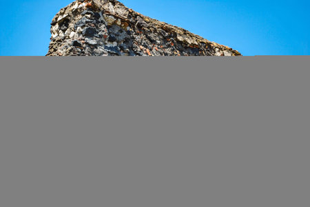 The remains of the ancient bell tower of the Cristo al Monte Church on the historical hillの写真素材