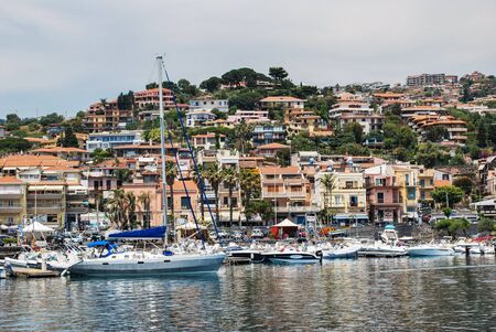 Acitrezza, Italy - June 01, 2017: A group of boats anchored in the small sicilian harborのeditorial素材