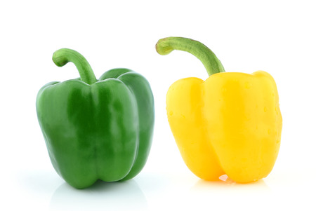 Green and Yellow pepper on white backgroundの写真素材