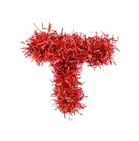 Tinsel Christmas decoration in form of T. On a white backgroundの写真素材