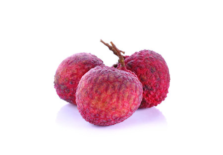 fresh lychees on white backgroundの写真素材