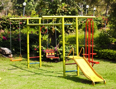 children playground equipment at botanical garden の写真素材