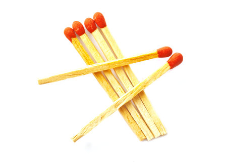 red wooden matches with isolated white background