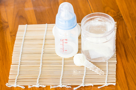 powdered milk and spoon for babyの写真素材