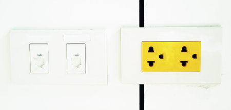 electrical outlet, yellow color is a sign that if the arbitrary power outage, has the power flow...