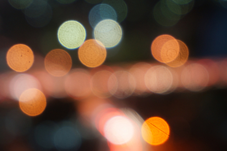 Night lights bokeh of a wide variety of colors including red, green, yellow, blue, orange and white.                                の写真素材