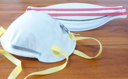 N95 Mask prevent respiratory tract infection, cover nose to mouth.                               の写真素材