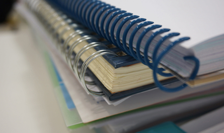 Office documents, the paper notes, account book placed on the desk at work.の写真素材