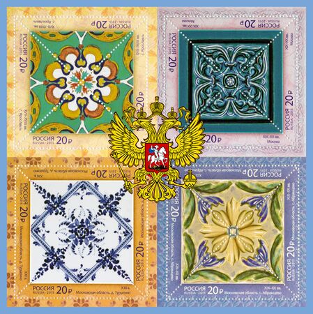 Collage. The  national emblem of Russia on the background of the postage stamps with the image of ceramic tilesの写真素材