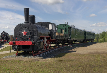Locomotive Lwn 9773 0-3-0, the middle category. Developed in the late 90-ies of the XIX century, on the basis of the engine "heavy type" with three driving wheel pairs, own design Nevsky shipyard in St. Petersburg with two passenger carsのeditorial素材