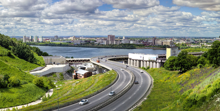 Russia, Nizhny Novgorod, a panorama of the city and the road to the metro bridge across the Oka River.の写真素材