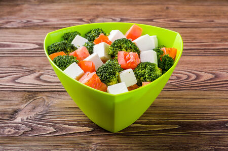 Broccoli salad with feta cheese and tomatoの写真素材