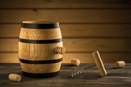Barrel and corkscrew on the tableの写真素材