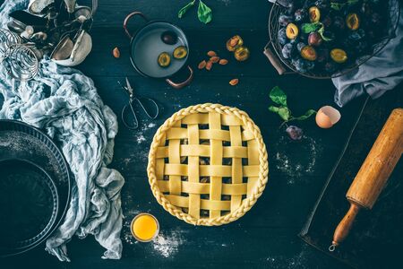 Plum pie making process, decorating cakeの写真素材