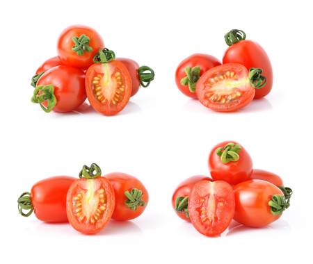 Grape or cherry tomatoes isolated on white background.の写真素材
