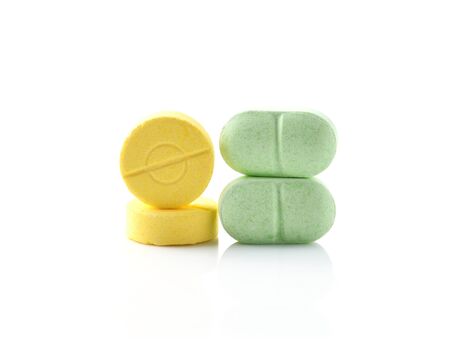Medical pill tablet isolated on white backgroundの写真素材