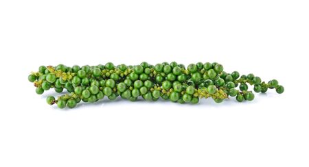 green peppercorns isolated on white backgroundの写真素材