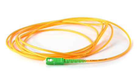Fiber optic cable on white backgroundの写真素材