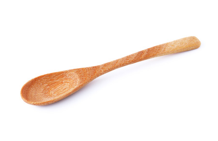 Wooden spoon isolated on white backgroundの写真素材