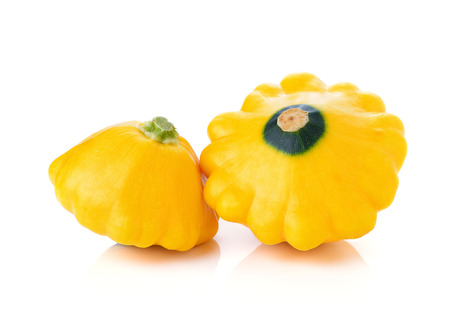 Yellow zucchini squash isolated on white backgroundの写真素材