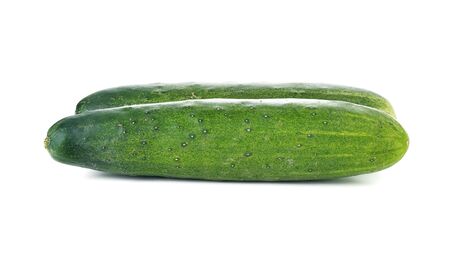 fresh green cucumbers isolated on whiteの写真素材