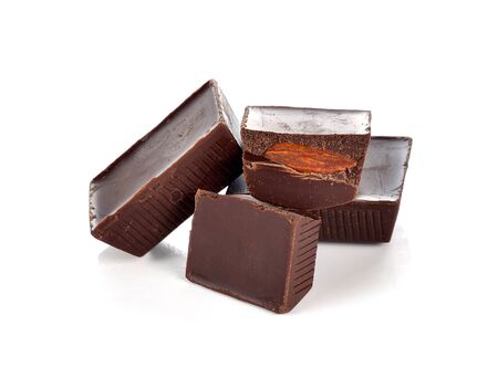 dark chocolate bars with nuts isolated on white backgroundの写真素材