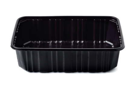 Empty black plastic container isolated on whiteの写真素材