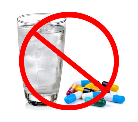 No pill concept-Do not eat the medicine with cold waterの写真素材