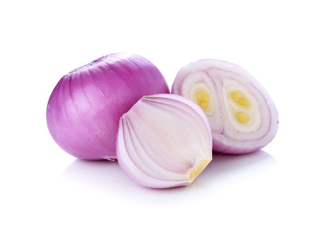 shallots isolated on white backgroundの写真素材