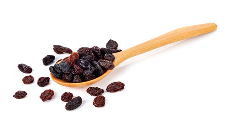 Dried raisins on a white backgroundの写真素材