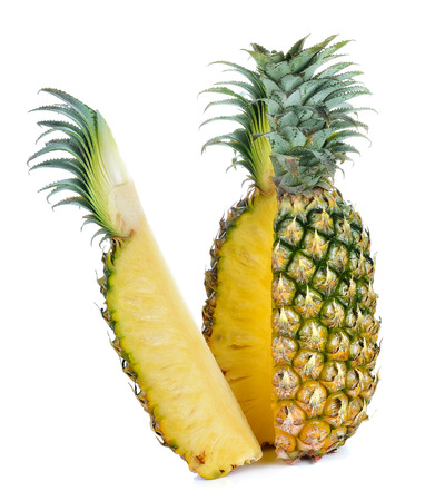 Sliced pineapple over white backgroundの写真素材