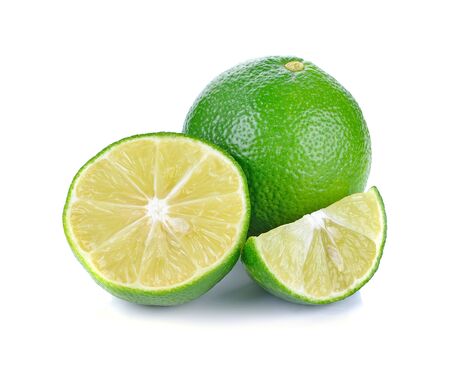 Fresh lime and slice isolated on white backgroundの写真素材