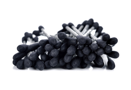 Cotton sticks,cotton wool,black-color on white background.の写真素材