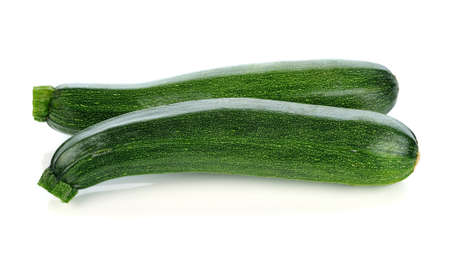 Fresh zucchini isolated on whiteの写真素材