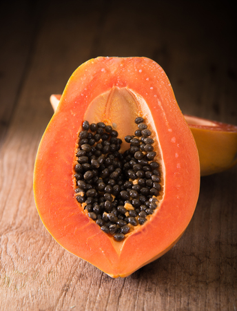 papaya fruit on wooden boardの写真素材