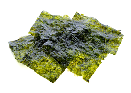 Sheet of dried seaweed, Crispy seaweed isolated on white background.の写真素材