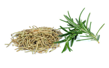 Dried rosemary leaves on white backgroundの写真素材