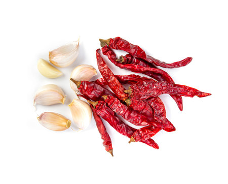 Dried chili with garlic isolated on white.
