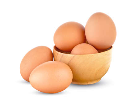 Fresh chicken eggs isolated on white backgroundの写真素材