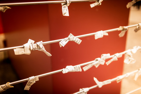 Omikuju charms at the Asakusa shrine, Tokyo, Japanのeditorial素材