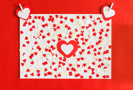 many red and white heart on white background. background in the style of Valentine's Day
