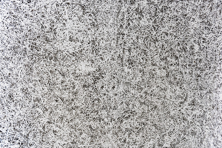 Close up of a recycled compressed wood chipboard. Useful for designers as backgroundの写真素材